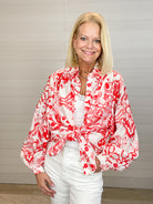 women's oversized button up blouse with watercolor paisley print, white background with red print