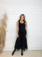 sleeveless dress with knit tank-top bodice and double layered tulle skirt