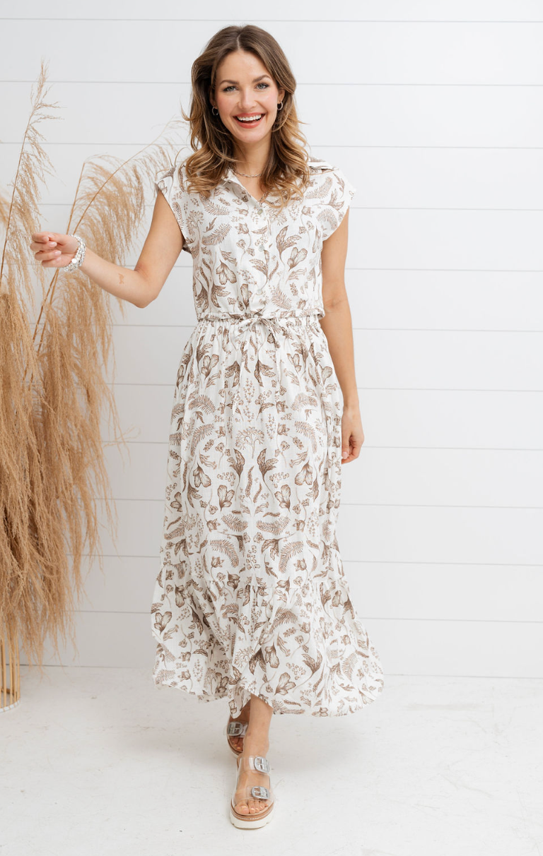 women's fashion skirt and matching top, drawstring, tiered skirt with a vintage-drawn botanical print, maxi length with elastic waist, shirt buttons down and has a collar